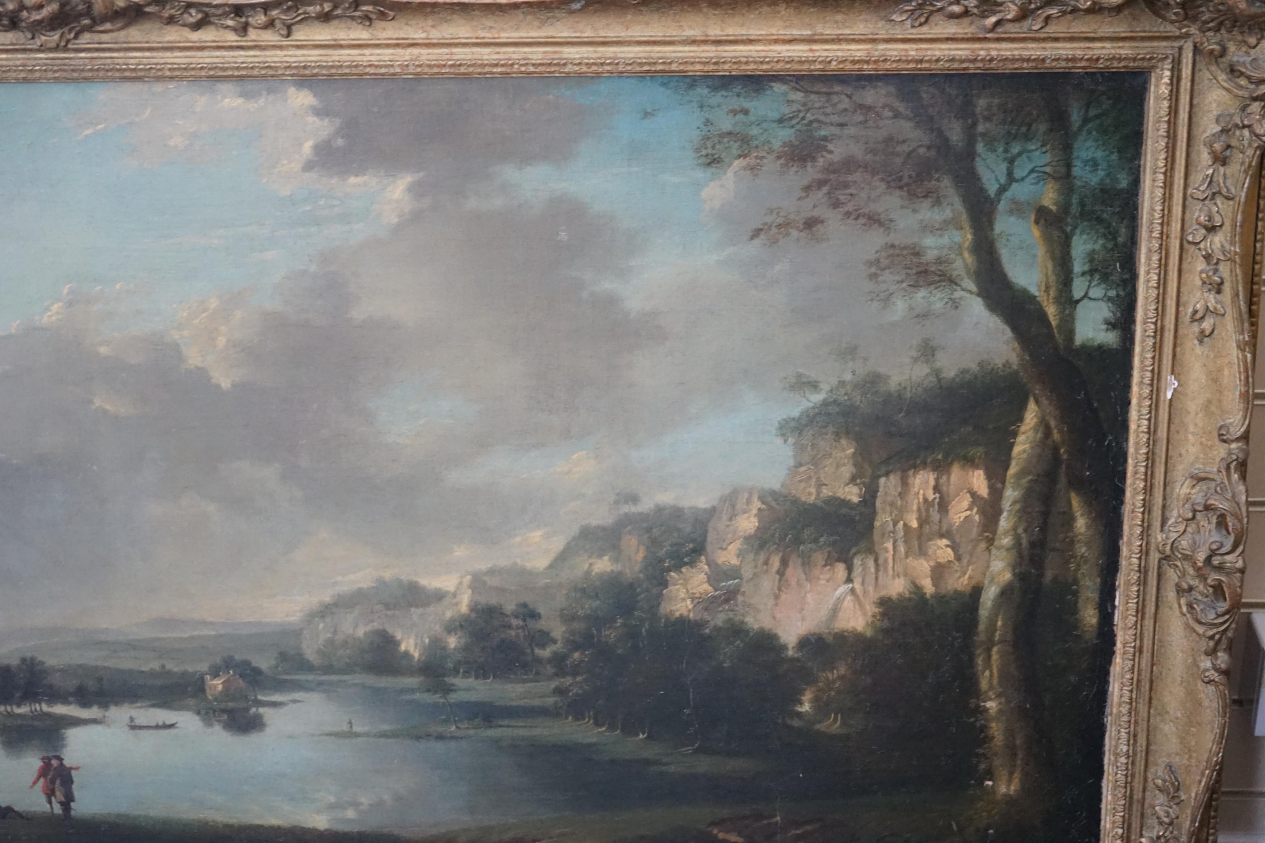 Attributed to George Lambert (English, 1710-1765), Extensive lake scene with figures in foreground, oil on canvas, 72 x 153cm